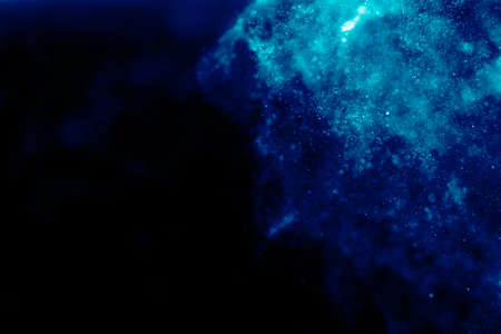 Abstract Blue bokeh defocus glitter blur background.