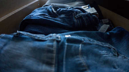 Denim trousers pants drawer folded
