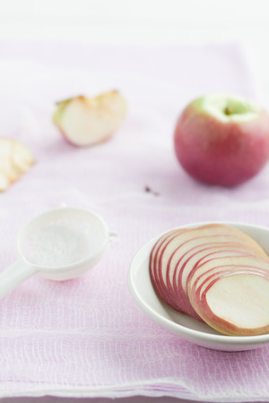 sliced applesの写真素材