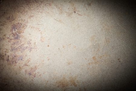 burnt metal background, vignetted, with space for text or imageの写真素材