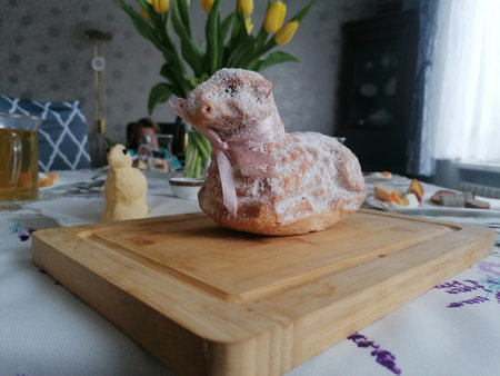 Cake with icing sugar on the table in the kitchen.の写真素材