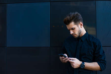 Hipster guy chatting on mobile phone