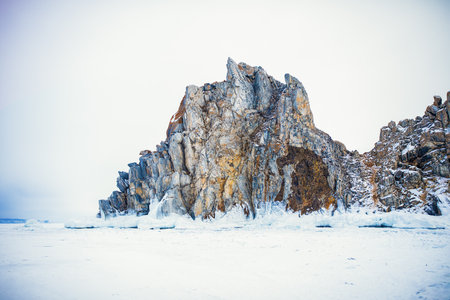 Rock formation at frozen Lake Baikal. Scenic winter landscape. Olkhon islandの写真素材