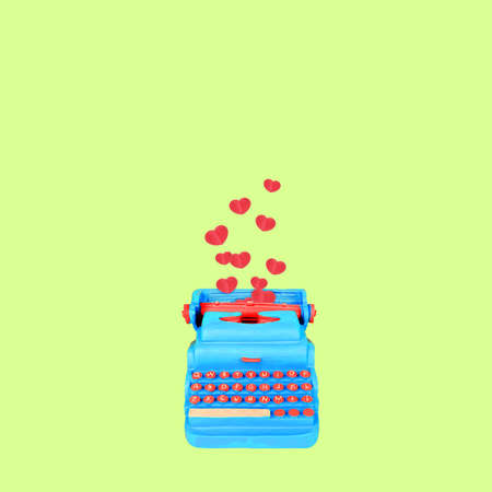 Typewriter keys keytops old style making lovely words of love hearts. Creative literature poetry or...