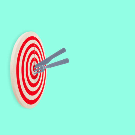 Red white target with fork and knife hit in center. Bullseye good food goal concept. Cuisine idea