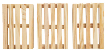 Three wooden pallets isolated on white background. Storage and transport equipment pallet