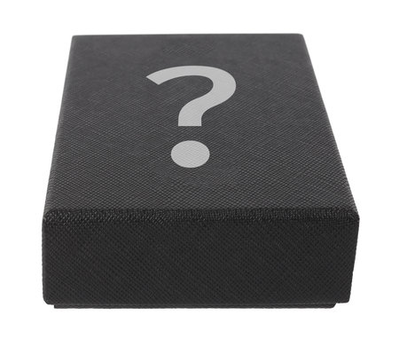 Mysterious cardboard black box closed with question mark secret container. Mystery package conceptの写真素材