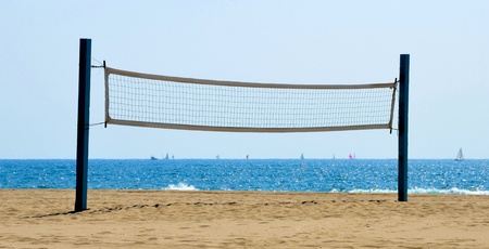 Beach volleyball net on a Californian sand beachの写真素材