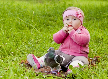 baby in grassの写真素材
