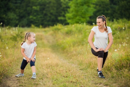child with her mother on the nature trainの写真素材