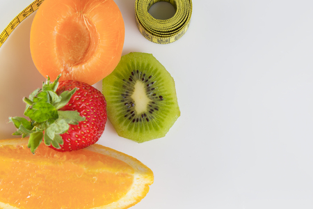 fruits for weight loss and measuring tapeの写真素材