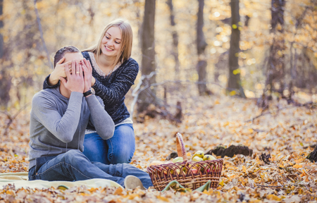 loving young couple in the autumn forestの写真素材