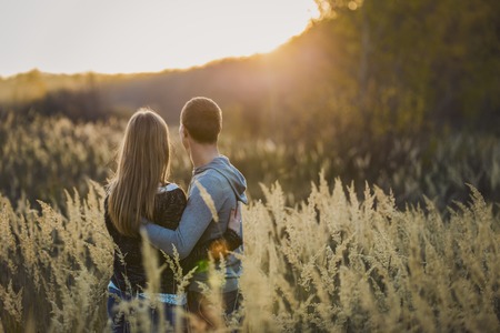 loving young couple in the autumn forestの写真素材