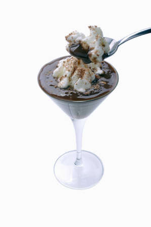 chocolate mousse with whipped cream with teaspoonの写真素材