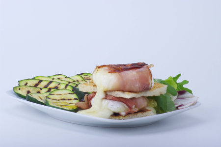 Tomino cheese with bacon の写真素材