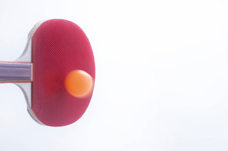 Rackets for table tennis with orange ball の写真素材