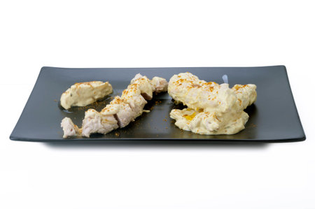 braid chicken and goat cheese curryの写真素材