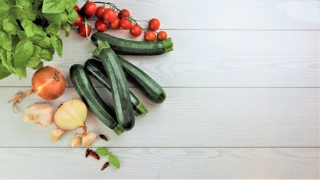 Fresh Vegetable Zucchini, tomatoes, basil Against White Backgroundの写真素材