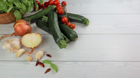 Fresh Vegetable Zucchini, tomatoes, basil Against White Backgroundの写真素材