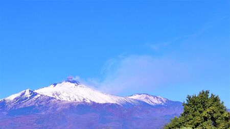 2019.11.27 Sicily. Italy. Etna volcano covered in snow  during an eruptive phase.の写真素材