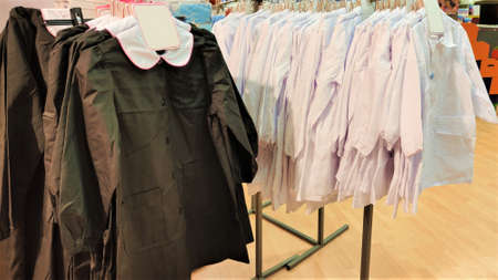 school uniform for sell in the department store
Children's school clothing in store
School clothes for boy and girl on hangerの写真素材