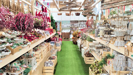 Shop market with Christmas, New Year s toys and decorations. Festive winter trade, fair in a shopping center, mall. Italyの写真素材