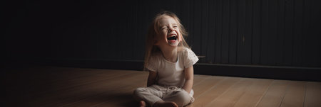 Portrait of a little girl laughing in front of black background. Banner. copyspace. Generation AIの素材