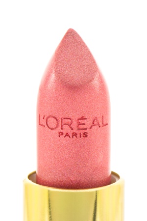 Arad, Romania - May 9, 2012: LOreal Paris Lipstick. LOreal is world leader in beauty products. Studio shot, isolated on white background.のeditorial素材