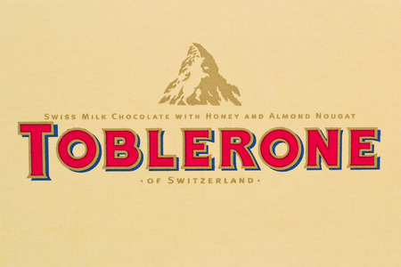 Arad, Romania - March 25, 2012 Toblerone logo printed on cardboard Studio shotのeditorial素材