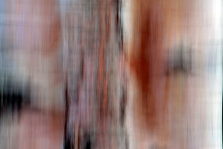 Blurring background. Vertical line plant. Vertical panning.