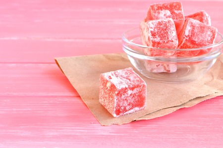 Turkish delight on a pink wooden backgroundの写真素材