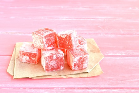 Turkish delight on a pink wooden backgroundの写真素材