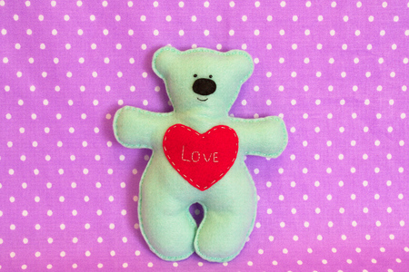 Handmade felt bear - felt bear, hand-stitched toy, a craft out of feltの写真素材