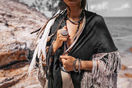 beautiful young stylish woman at sunset close up