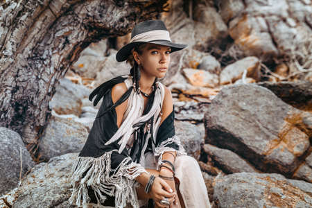 beautiful young stylish woman at sunset portrait