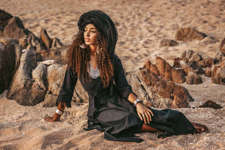 beautiful young tribal woman with wearing turban outdoors