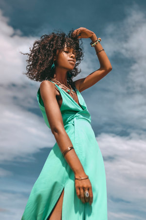 Beautiful young stylish woman posing outdoors