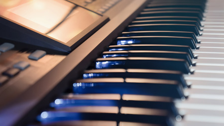 Close view of an electronic musical instrument.
