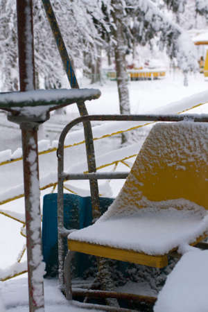 Ferris wheel in amusement park. The first snow.の写真素材