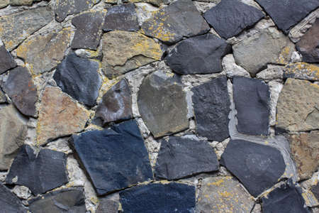 Background from a wall of granite stones.