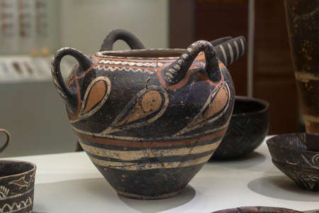 Exhibit of the Heraklion Archaeological Museum. Heraklion Archaeological Museum. Luxery vessel from the palace of Rhaistos which still preserve the colors of their complex polychrome decoration, Phaistos, 1800-1650 BCの写真素材