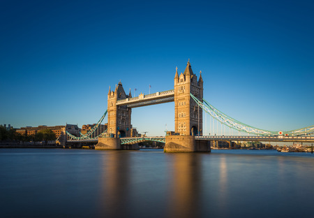 The iconic Tower Bridge at sunset with clear blue sky London UKの写真素材