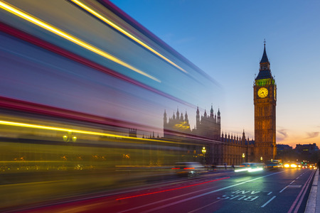 Double Decker bus with the Big Ben at blue hour London UKの写真素材
