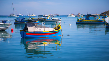 Typical Luzzu colorful fishing boats of Valletta, Maltaの写真素材