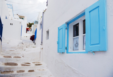 Blue window at Mykonos street, Greeceの写真素材