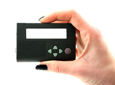 Woman's hand holding pager with blank screenの写真素材