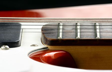 Close up at twenty second fret of an electric guitar