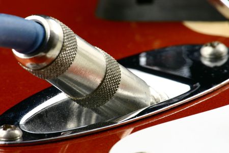 Close up at jack plugged into electric guitarの写真素材