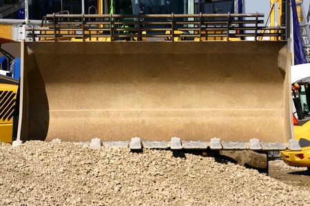 Front view at large bucket of a heavy loader の写真素材