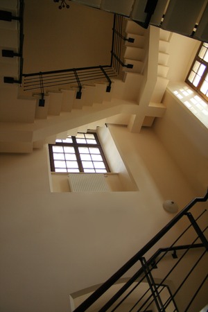 Perspective view at elegance shadowed staircase with windowsの写真素材